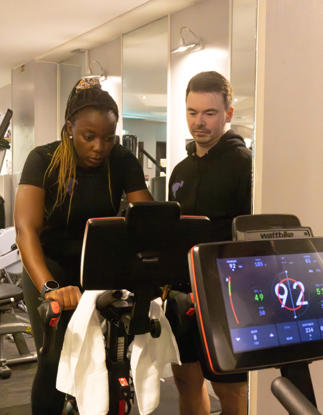 Trainer working with client